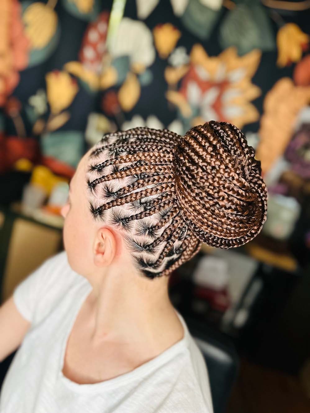 Knotless Braids hairstyle by TeebraidingZone
